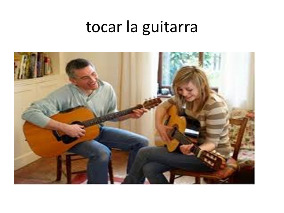tocar la guitarra