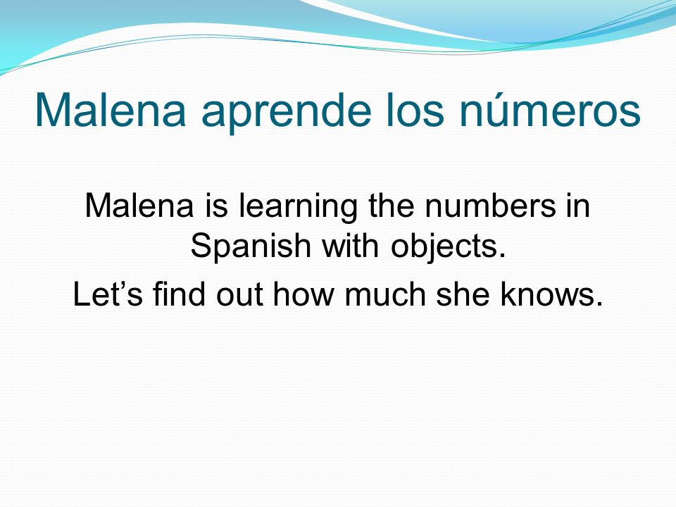 Malena aprende los números Malena is learning the numbers in Spanish with objects.