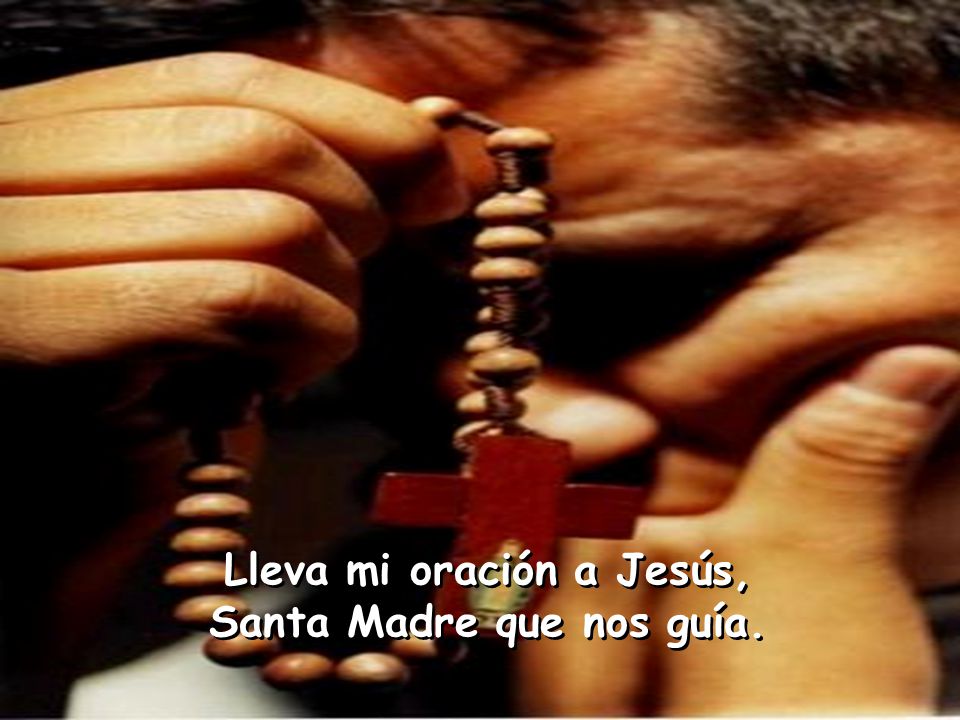 Con un rosario en la mano te rezo a ti mi Virgen María Con un rosario en la mano te rezo a ti mi Virgen María